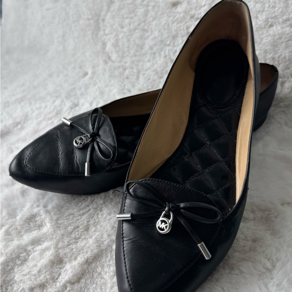 Michael Kors Shoes - Michael Kors Black Leather Pointed-Toe Bow Flats with Logo Charm